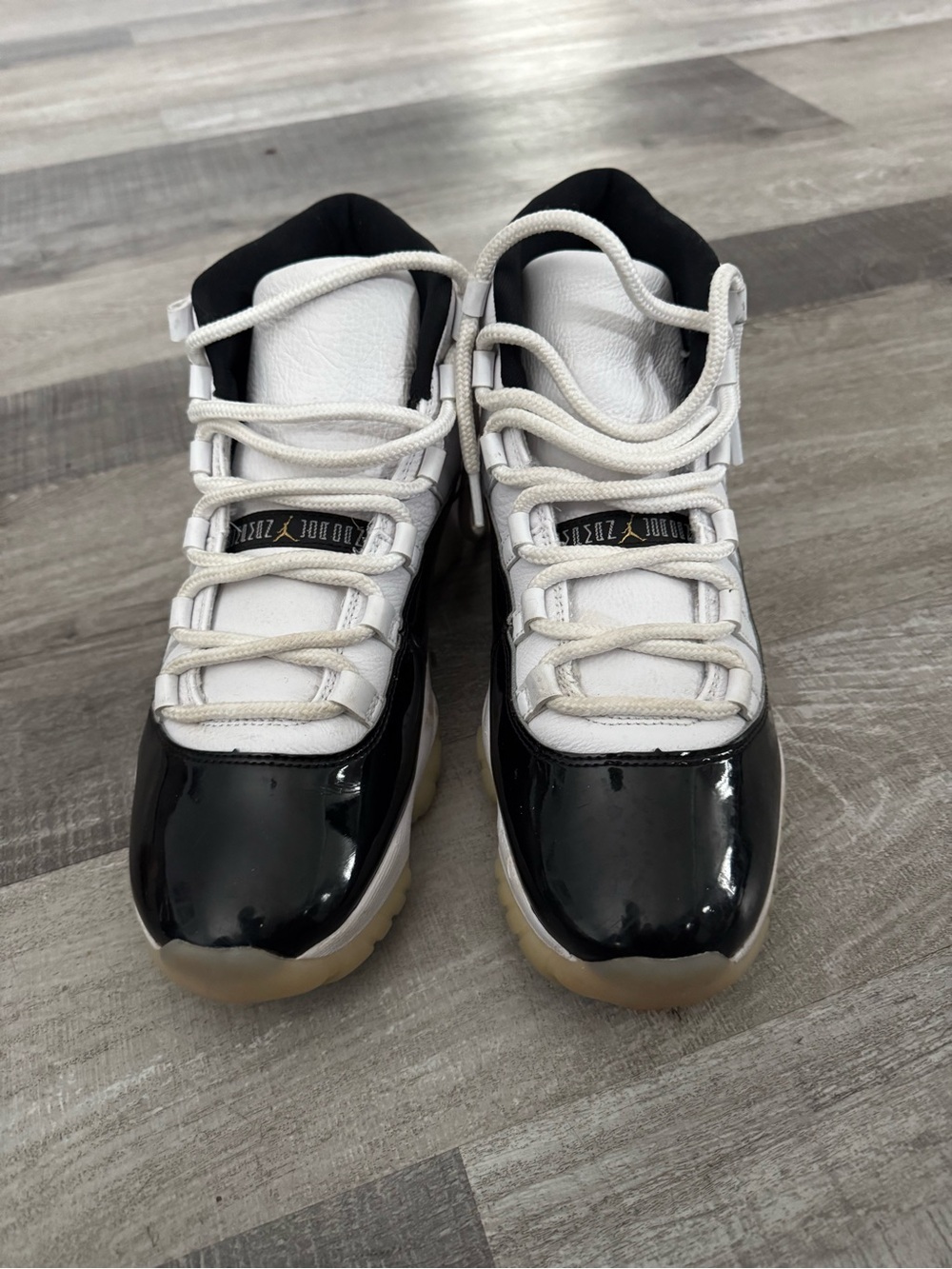 Jordan Retro 11 Black and White Patent Leather Sneakers